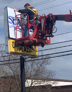 Northeastern Signs changes out United Neighbors for SeaComm at the Carbone Plaza in Watertown