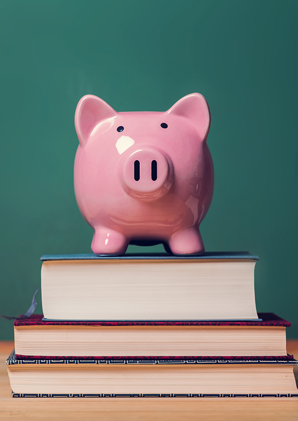 Piggy bank and textbooks graphic